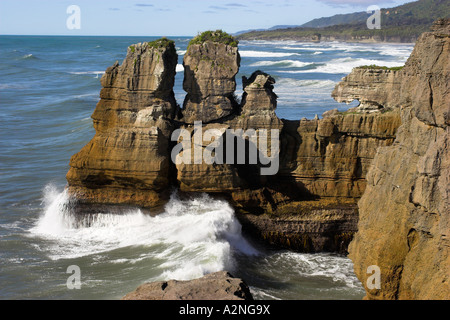 Rock formations near to the Pancake rock blowholes in the Punakaiki region on South Island, New Zealand. Stock Photo