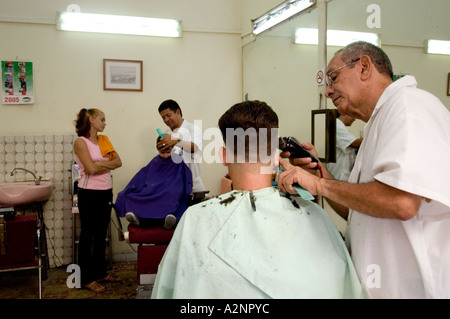 Barber cutting hair, Havana Cuba Stock Photo