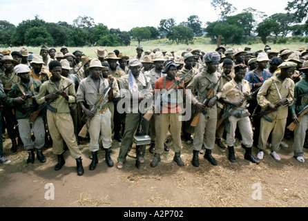 ZIMBABWE RHODESIA 1980 ZANU PATRIOTIC FRONT FIGHTERS FOR MUGABE COME IN FROM THE BUSH AS PART OF THE PEACE PROCESS Stock Photo