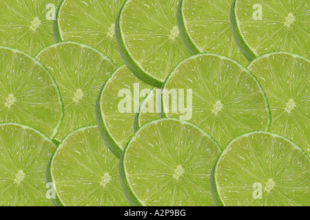 lime fruit (Citrus aurantifolia), lime slices Stock Photo