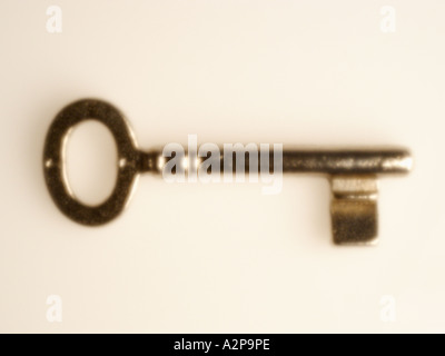 Skeleton key on white background -  soft focus shot with pinhole camera Stock Photo
