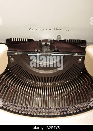 Detail of typewriter and piece of paper with writing Once Upon A Time Stock Photo