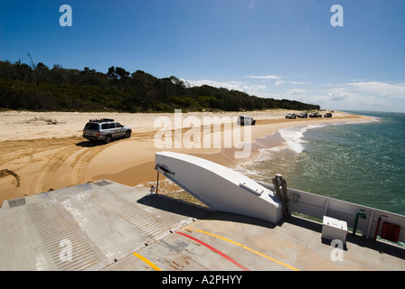 Cars drive off  the Fraser Island Ferry Queensland Australia Stock Photo