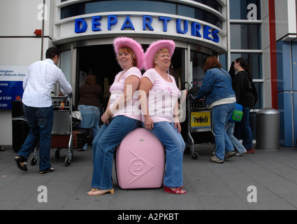 Passengers waiting outside the departures terminal at East Midlands Airport UK Stock Photo