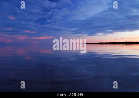 Blue sunset on a calm Lake Huron at Singing Sands Provincial Park Bruce Peninsula Ontario Stock Photo
