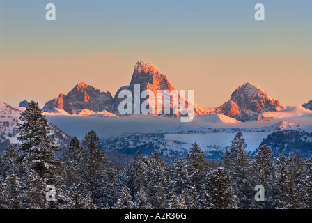 Idaho Driggs A colorful sunset on the majestic Teton Mountains in ...