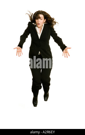 business woman jumping high in the air to celebrate success Stock Photo