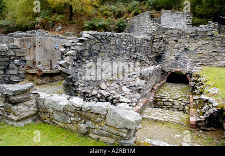 Remains of 19th century Bryntail Lead Mine below dam of Clywedog reservoir Powys Mid Wales UK Stock Photo