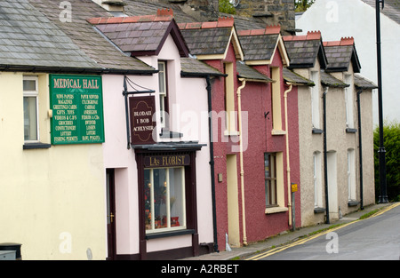 Shops and terraced cottages in the rural Welsh language speaking village of Tregaron Ceredigion West Wales UK Stock Photo