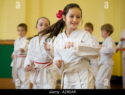 A karate class at a primary school in Wolverhampton UK The class is part of the curriculum Stock Photo