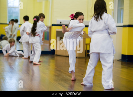 A karate class at a primary school in Wolverhampton UK The class is part of the curriculum Stock Photo