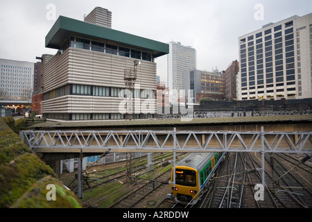 The Grade 2 listed corrugated concrete signal box overlooking railway lines leading into New Street station in Birmingham UK Stock Photo