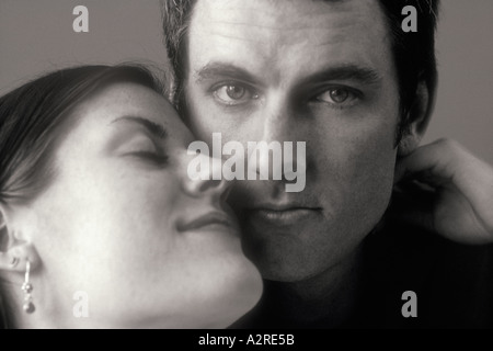 Black and white Interior portrait of male & female 20 to 29 years couple Stock Photo