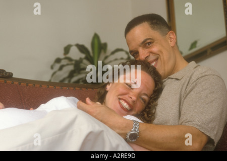 Portrait of mixed Hispanic woman and Hispanic male Stock Photo