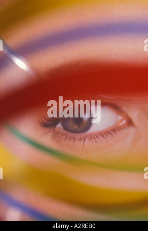Female eye through painted "glass" Stock Photo
