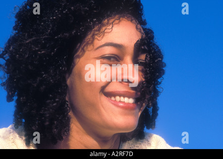 Portrait of smiling mixed Caucasian African American female Stock Photo
