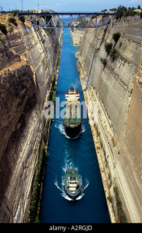 Tug leadingship through Corinth Canal in Greece Stock Photo