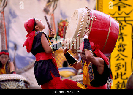 The Mulan Drummers from Taiwan performing on Taiko Drums at Taiwanese Cultural Festival in Vancouver British Columbia Canada Stock Photo