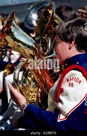 A Young Boy playing a Sousaphone or Tuba in a Marching Band Stock Photo