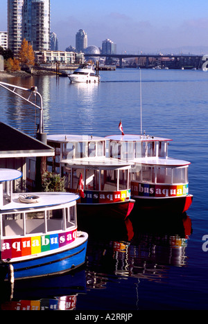 Aquabus Neighbourhood Ferries docked in False Creek at Granville Island in City of Vancouver British Columbia Canada Stock Photo
