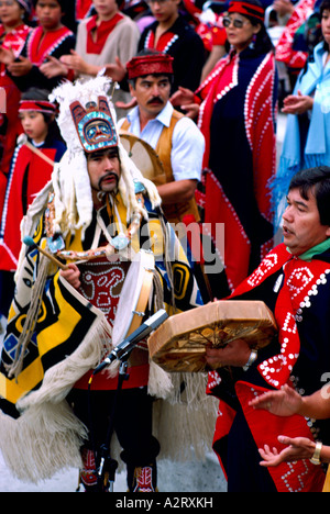 Native American Indians in Traditional Ceremonial Regalia celebrating at a Pow Wow in Bella Bella British Columbia Canada Stock Photo