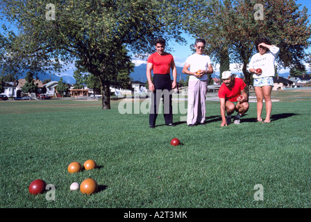 Bocce Players playing the Italian Game of Bocce Ball in a Park in East Vancouver British Columbia Canada Stock Photo