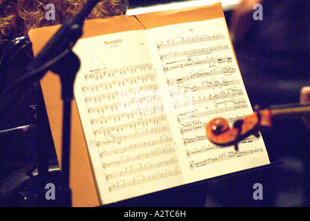 Sheet music in orchestra at the late Italian film composer Ennio Morricone's (1928-2020) concert, Hammersmith Apollo, London, UK. December 2006. Stock Photo