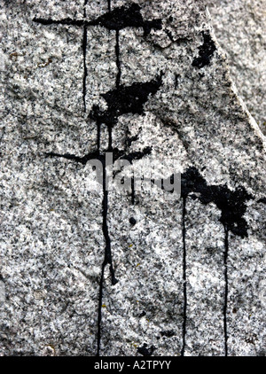 poland granite memorial  column in treblinka extermination camp with black paint drips Stock Photo