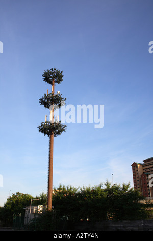 mobile phone antenna tower shaped like a tree Stock Photo