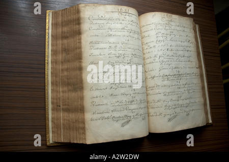 Open volume of an ancient notary book, in Paris national archives, France. Stock Photo