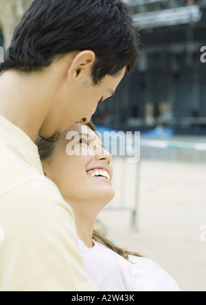 Teen couple embracing Stock Photo