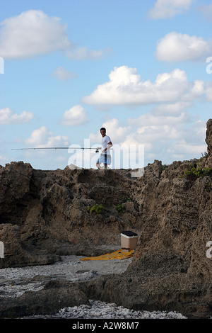 Fishing and relaxation on the rocky Habonim beach Israel Stock Photo