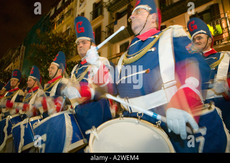 Basque men in period costume parade and play drums, La Tamborrada ...