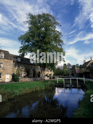 A summers afternoon in the popular cotswolds village of Lower Slaughter with its stream. Stock Photo