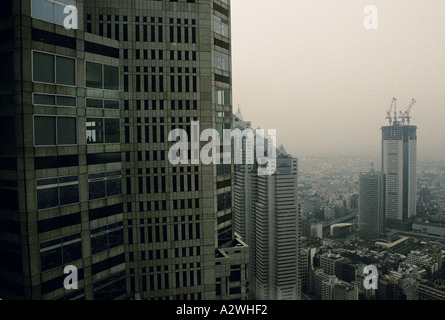 pollution smog over the shinjuku business area tokyo Stock Photo