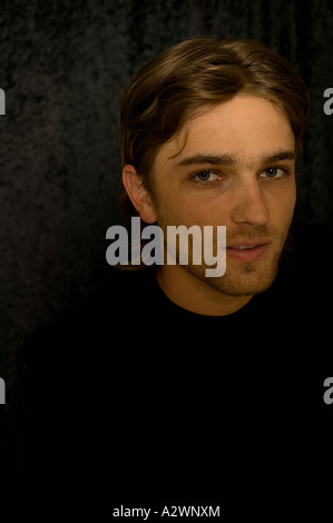 Young man smiling, portrait Stock Photo