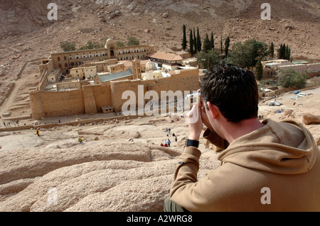 St Catherine's Monastery at the foot of Mount Sinai Sinai Egypt, tourist taking a photograph of St Catherine's Monastery Stock Photo