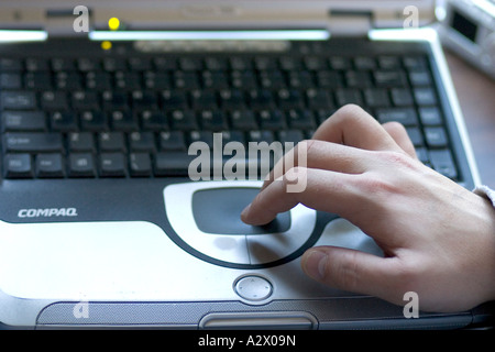 Operating trackpad on laptop computer. Plainfield Illinois IL USA Stock Photo