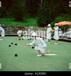 Mature adult women playing lawn bowls. Stock Photo