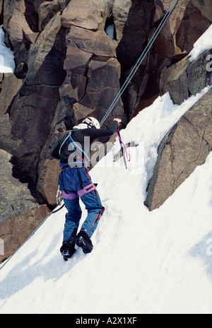 Mountaineering. Climber on snow-covered rock face. New Zealand. Ruapehu. Stock Photo