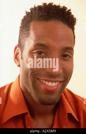Portrait of young man smiling. Stock Photo