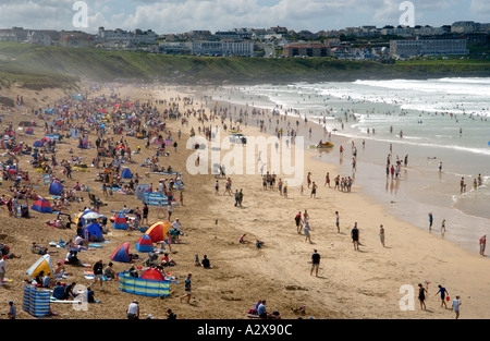 Activity at Fistral Beach Newquay in Cornwall England UK on a busy August summer day Stock Photo