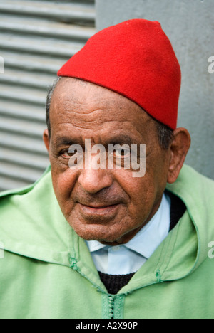 Fes el Bali Morocco North Africa Portrait of a man in the old medina wearing a Fes 2007 2000s HOMER SYKES Stock Photo