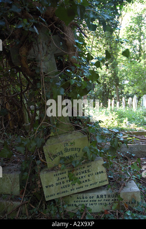 Crooked headstone in Highgate cemetery Stock Photo