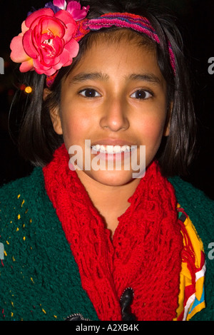 Halloween trick or treater wearing a Mexican flower girl costume age 11. St Paul Minnesota USA Stock Photo