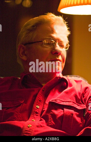 Man in red shirt age 59. St Paul Minnesota USA Stock Photo