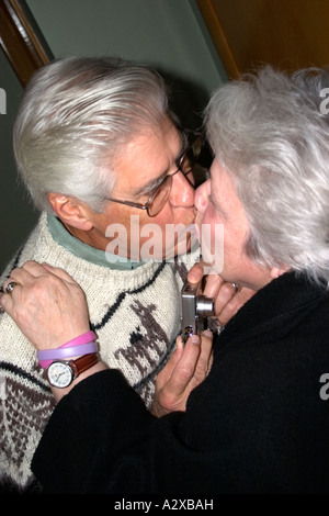 Romantic mature couple age 70 kissing. Plainfield Illinois USA Stock Photo