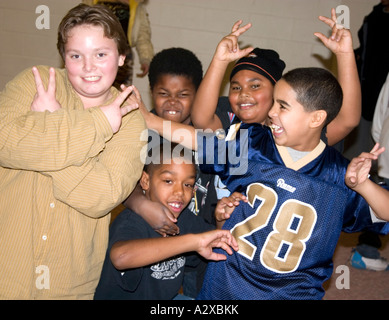 Happy children age 10 taking a break from after school study program. St Paul Minnesota USA Stock Photo