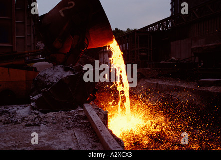 UK Industry. Steelworks. Molten iron ore pouring. Stock Photo