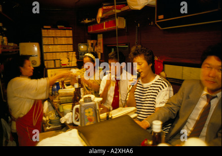 Businessmen in karaoke bar tokyo hi-res stock photography and images - Alamy